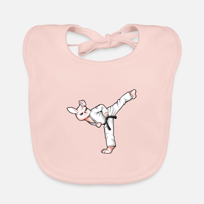 Lapin de dessin animé faisant de l’hapkido - Bavoir bio Bébé - rose