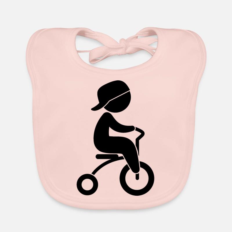 Garçon qui monte son tricycle Bavoir bio Bébé