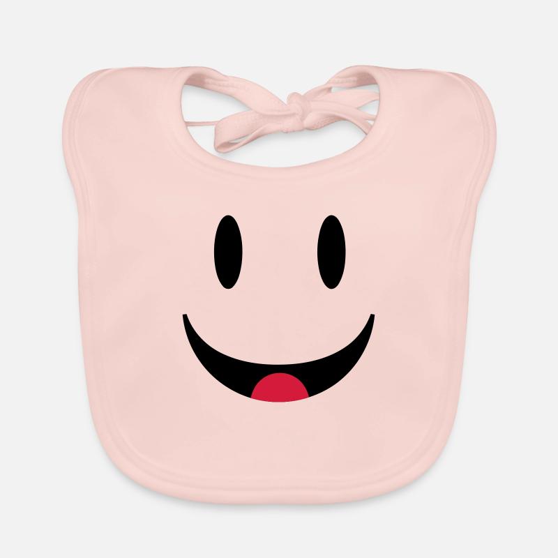 Visage souriant heureux avec la langue Bavoir bio Bébé