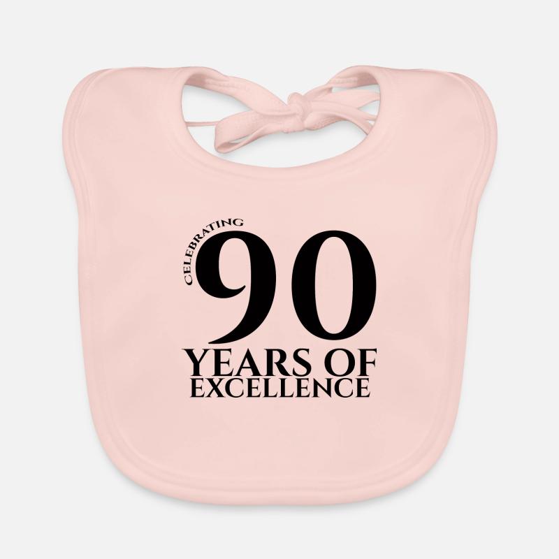 90e anniversaire: Célébration de 90 ans d'excellence - Bavoir bio Bébé - rose