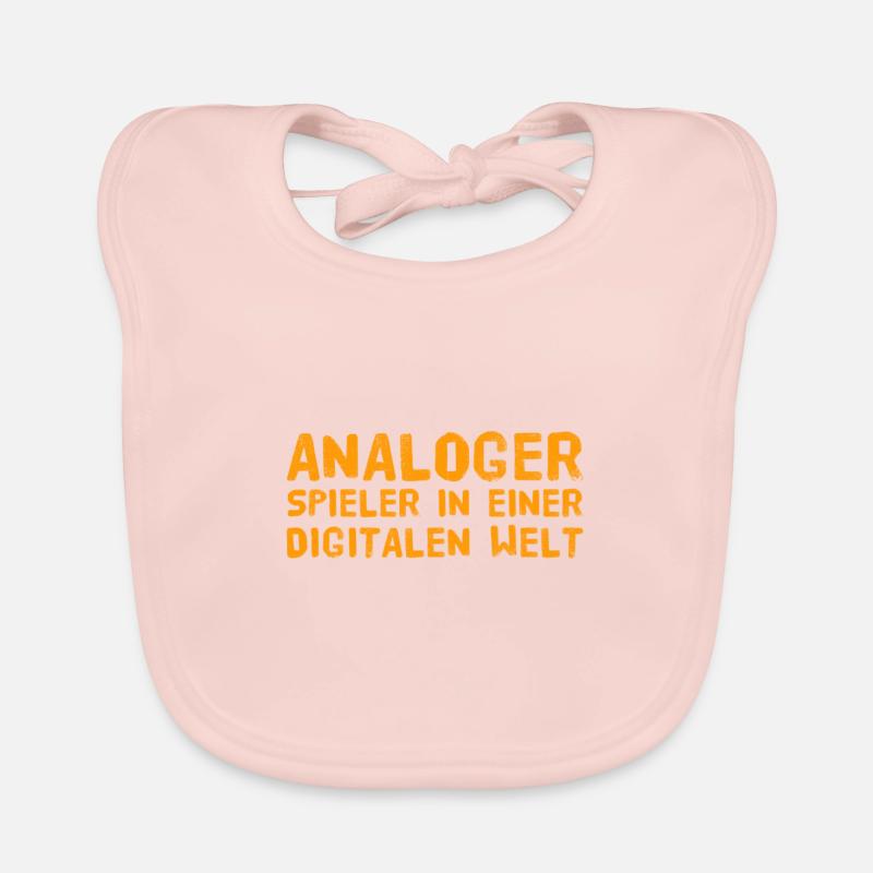 Devant vous se trouve un lecteur analogique Bavoir bio Bébé