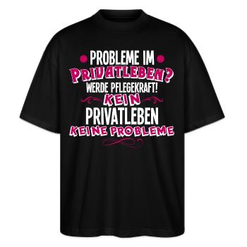 Pflegekraft - Stanley/Stella Oversized Unisex Bio T-Shirt Blaster 2.0 - Schwarz - Vorne - Alina (178cm) & Michal (187cm)