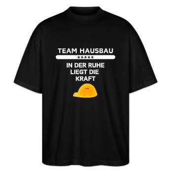 Team Hausbau - Stanley/Stella Oversized Unisex Bio T-Shirt Blaster 2.0 - Schwarz - Vorne - Alina (178cm) & Michal (187cm)