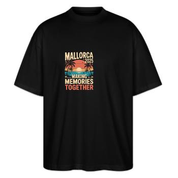 Mallorca 2025 - Stanley/Stella Oversized Unisex Bio T-Shirt Blaster 2.0 - Schwarz - Vorne - Alina (178cm) & Michal (187cm)