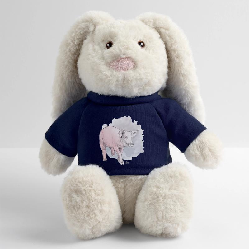 Cochon mignon devant une masse colorée Lapin en peluche recyclé MiniFeet® Crème
