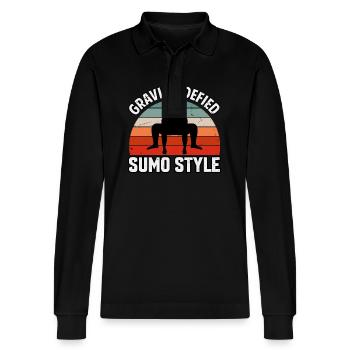 Schwerkraft trotzte dem Sumo-Stil - Stanley/Stella Unisex Bio-Langarm-Poloshirt Prepster - Schwarz - Vorne - Anna (173cm) & Nico (186cm)