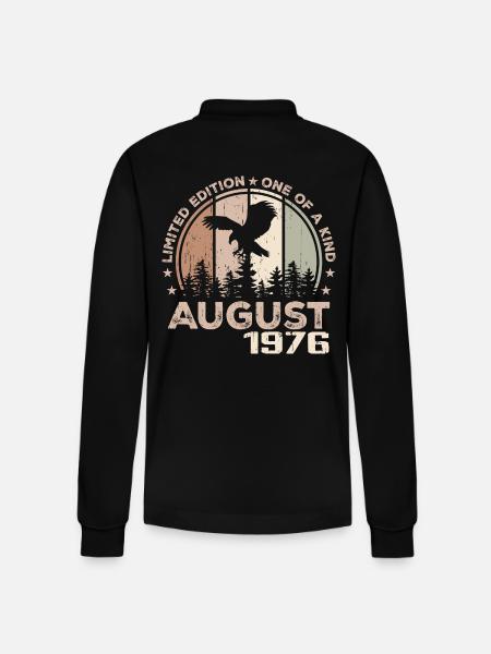 Uforlignelig siden august 1976, 48-års jubilæum - Stanley/Stella Prepster økologisk unisex langærmet poloshirt - sort
