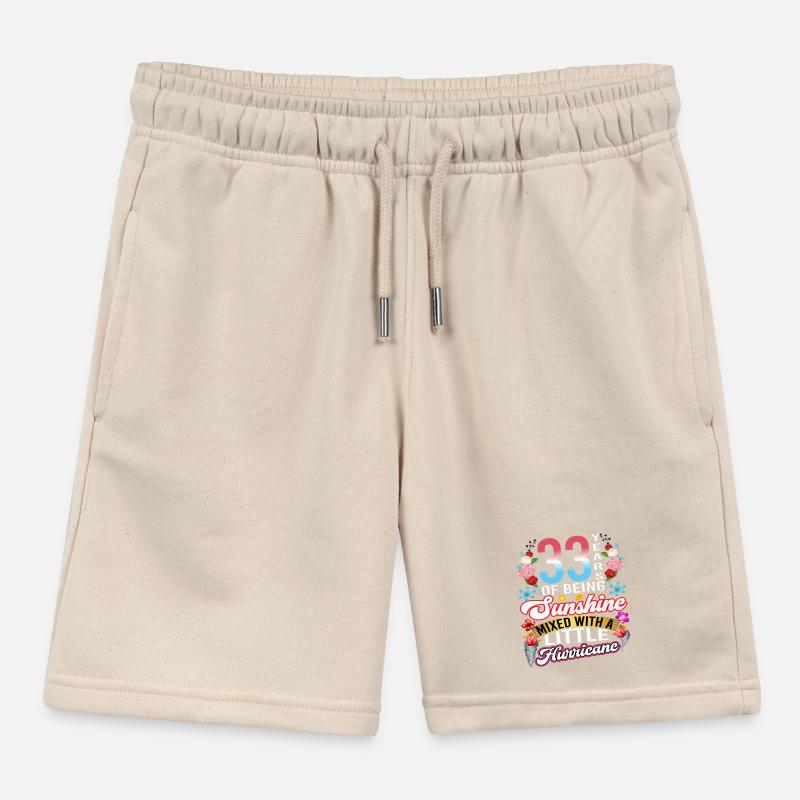 33 ans de soleil mélangés à un petit Short de jogging enfant bio Stanley/Stella