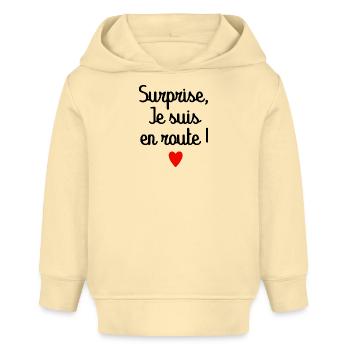 Surprise je suis en route - annonces grossesse - Sweat à capuche bébé bio Stanley/Stella - crème - Devant
