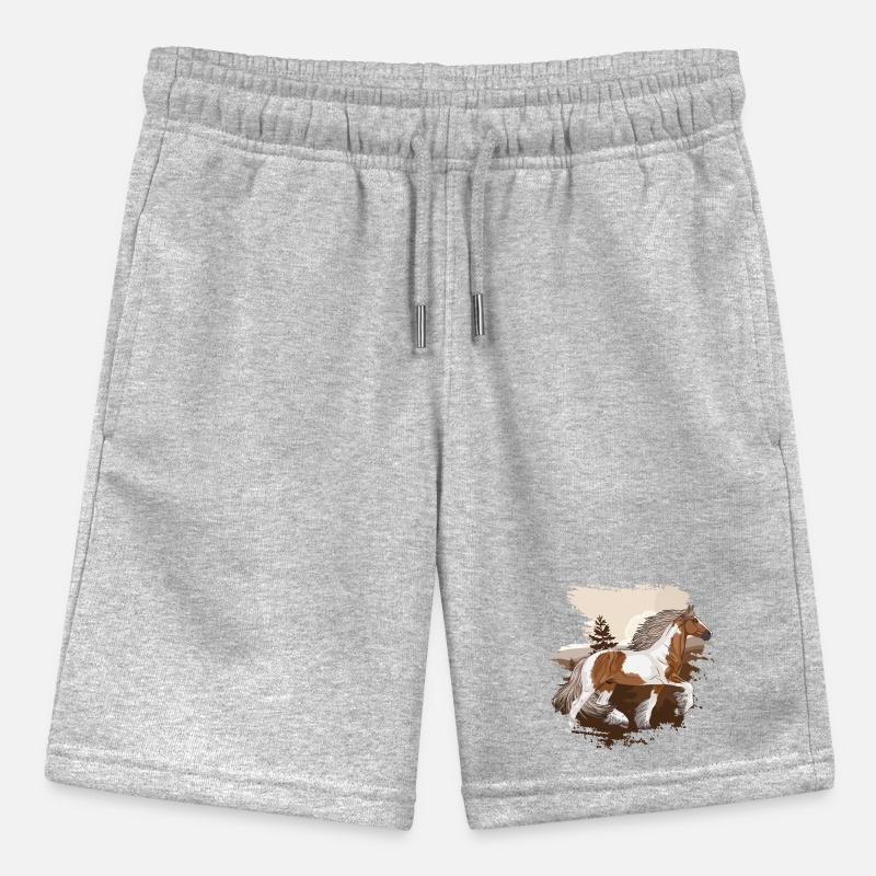 Ein irisches Kohlenpferd, das vor Bergen trabt Stanley/Stella Teenager Bio-Joggingshorts MINI BOLTER