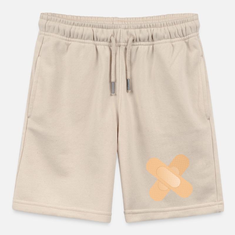 crossed sticking plaster as a design element Stanley/Stella MINI BOLTER Organic Teen Jogging Shorts