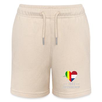 Mali and the Netherlands 100% friendship - Stanley/Stella MINI BOLTER Organic Teen Jogging Shorts - soft Ecru - Front