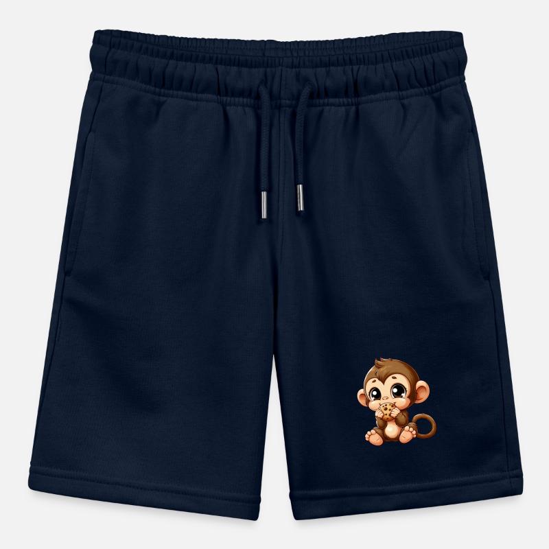 Mignon chimpanzé grignote sur des biscuits Short bio MINI BOLTER Stanley/Stella Ado