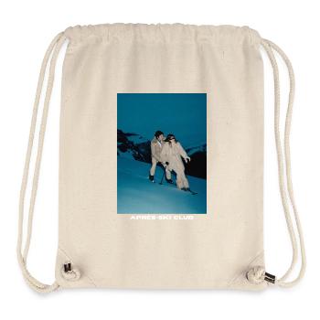 Elegant skier couple in snowy landscape - Stanley/Stella Recycled Gym Bag - natural - Front