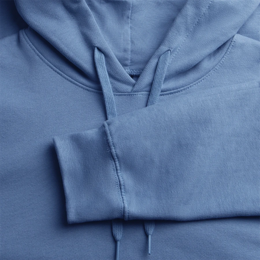 Pisa badge on a gildan unisex softstyle® midweight hoodie, carolina blue, close-up