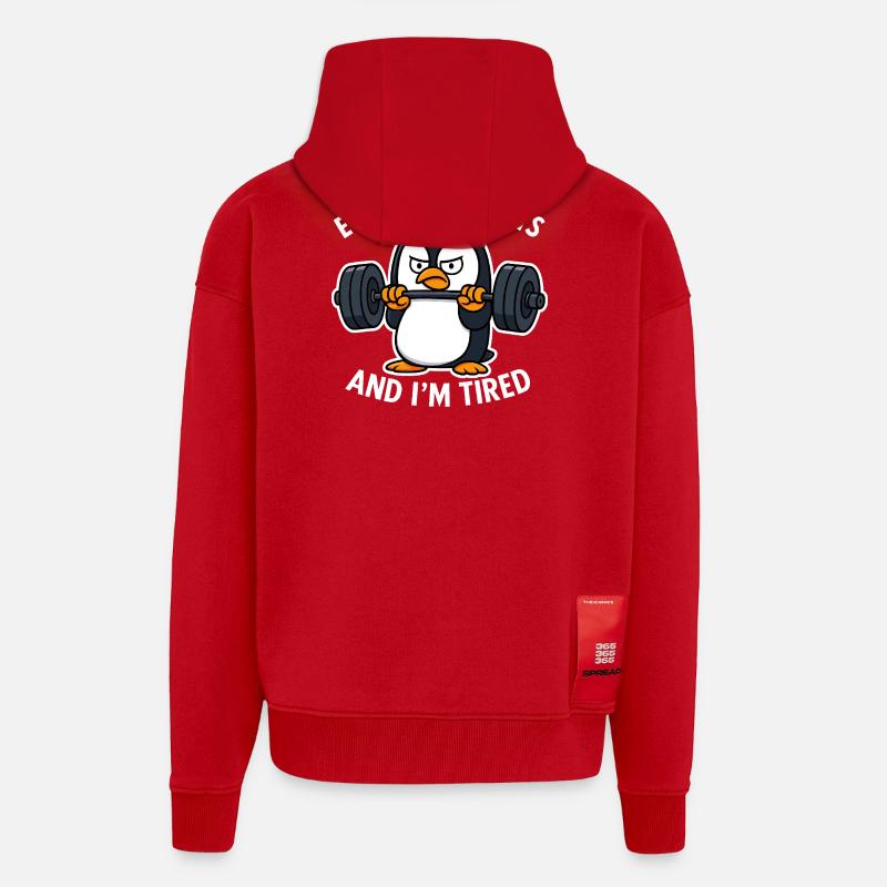 Grumpy Penguin Lifting Weights - Veste à capuche bio épaisse oversize fabriqué en UE - rouge