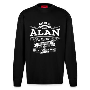 ALAN, DER KATALYSATOR FÜR DEINEN ERFOLG - Heavyweight Oversized Organic Langarmshirt Made in EU - SOLID BLACK - Vorne
