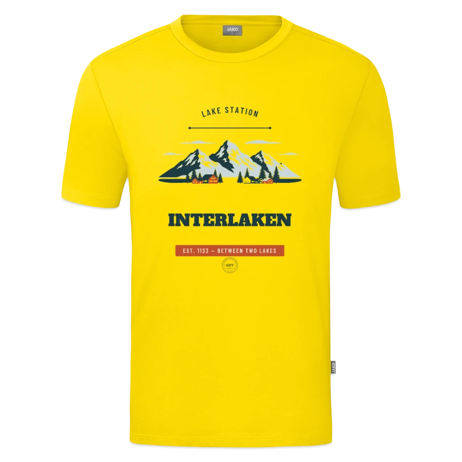 Interlaken badge on a jako organic teen t-shirt , yellow