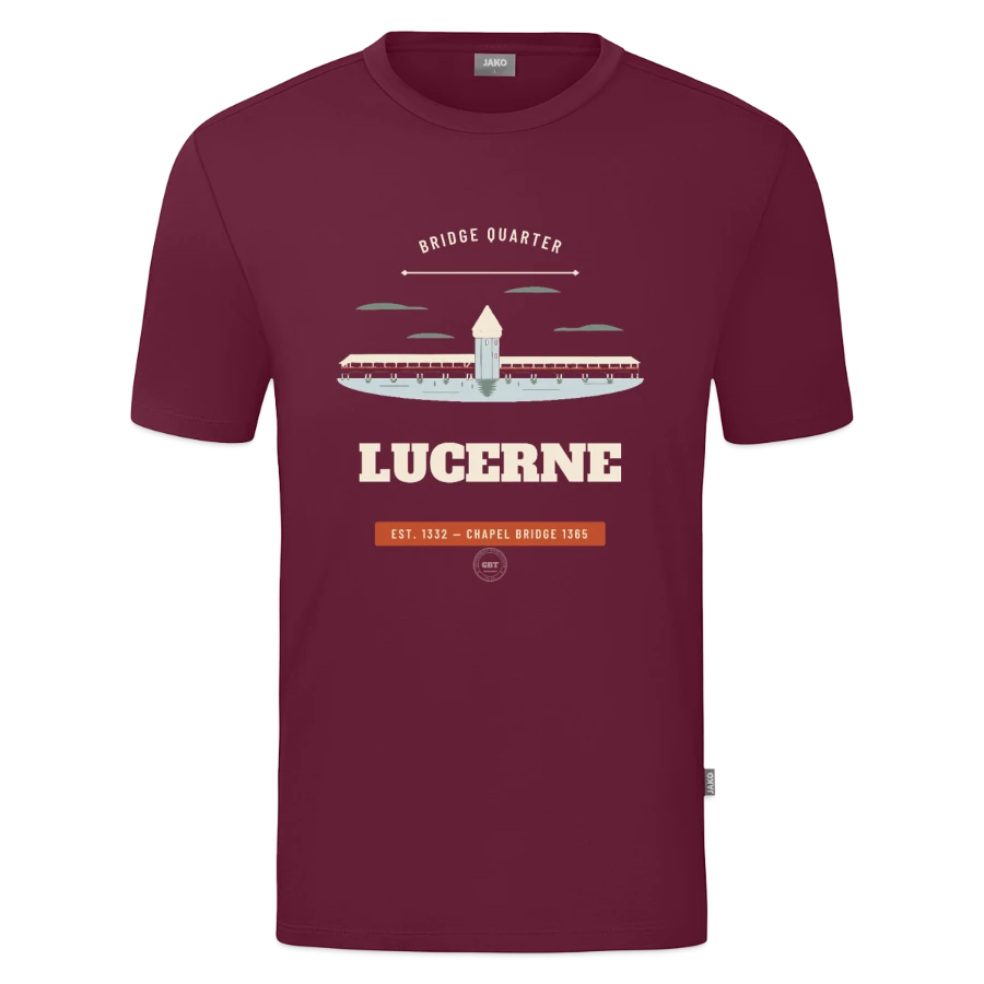 Lucerne badge on a jako organic teen t-shirt , wine