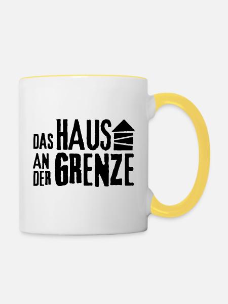 Das Haus an der Grenze - Tasse zweifarbig - Weiß/Gelb
