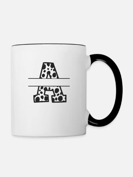 Personalisierter Kuhmusterbuchstabe - Tasse zweifarbig - Weiß/Schwarz