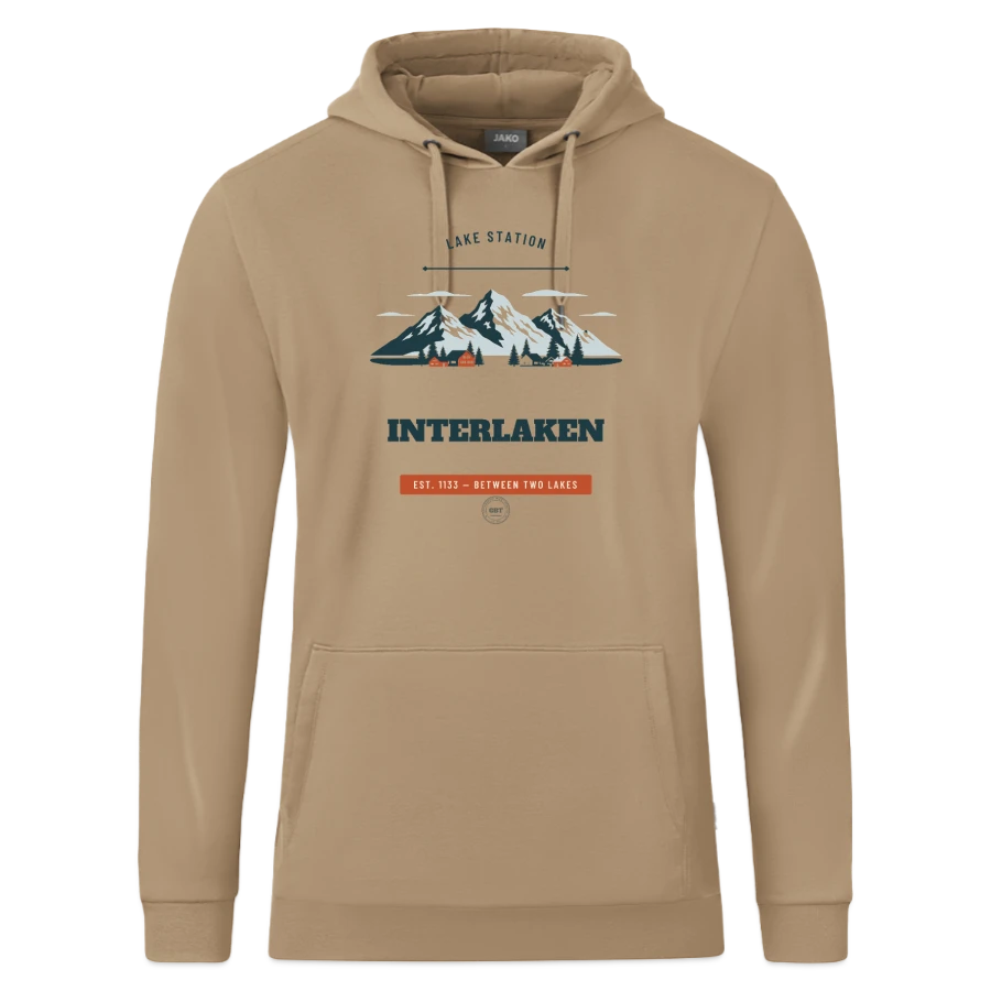 Interlaken badge on a jako organic hooded sweatshirt , beige