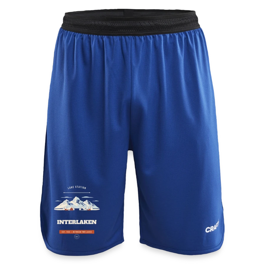 Interlaken badge on a craft progress kids’ basketball shorts, royal blue