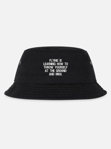 flying is learning how to throw yourself at the - Kids’ Bucket Hat - black