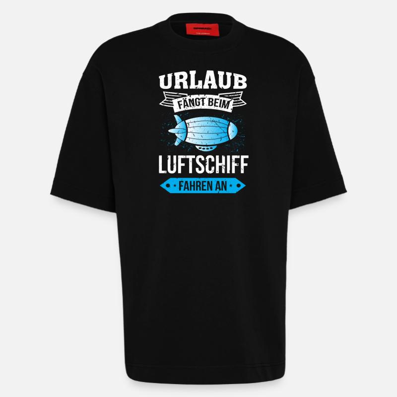 Luftschiff Urlaub fängt an - Heavyweight T-Shirt - made by SPREAD  - SOLID BLACK