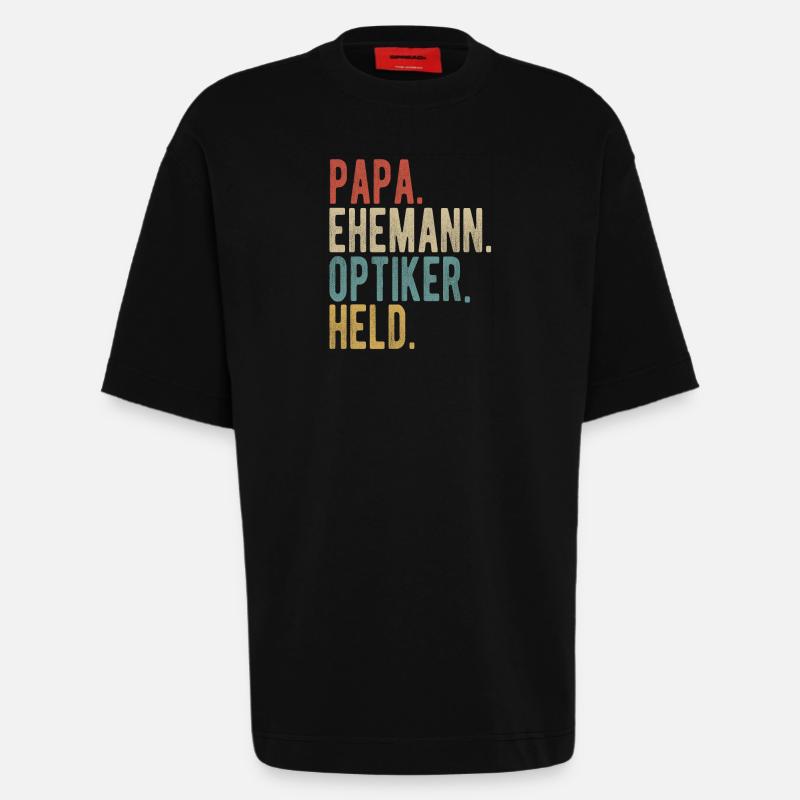 Optiker Papa Ehemann Held - Heavyweight T-Shirt - made by SPREAD  - SOLID BLACK
