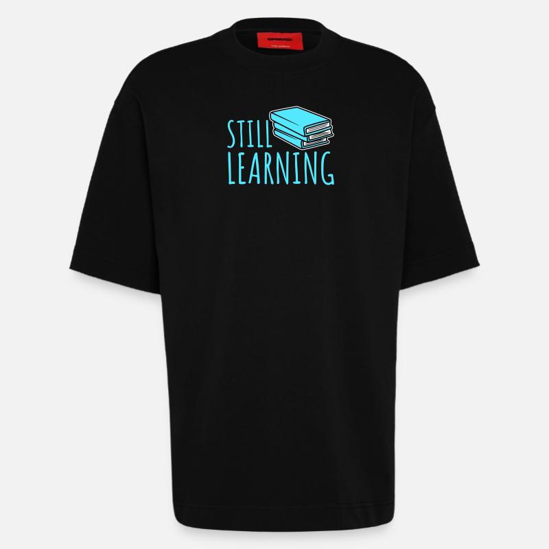 Still Learning Growth Student Motivation Saying - Heavyweight T-Shirt - made by SPREAD  - SOLID BLACK