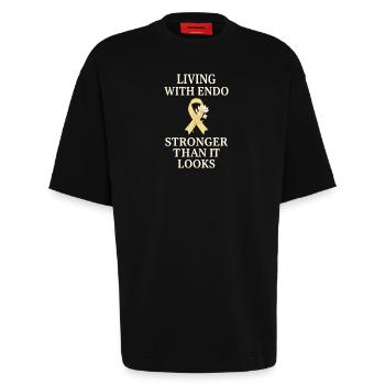 Sensibilisation à l’endométriose Guerrier de l’endo - T-shirt bio épais oversize fabriqué en UE - SOLID BLACK - Devant - Fiona (171cm)