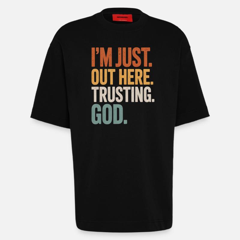 I'M JUST OUT HERE TRUSTING GOD - Heavyweight T-Shirt - made by SPREAD  - SOLID BLACK