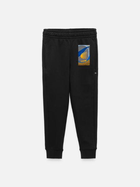 Goldene Strahlen auf urbanem Bogen - Kinder/Teenager Premium Sweathose - Schwarz