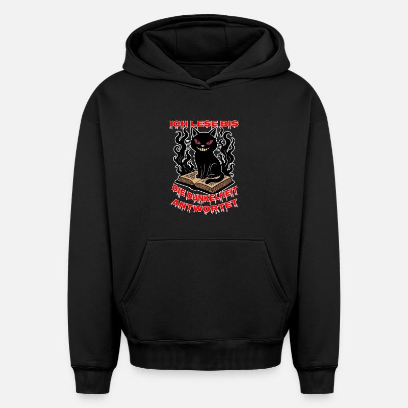 Dunkle Katze über dem Buch - Oversized Heavyweight Unisex Hoodie - Schwarz