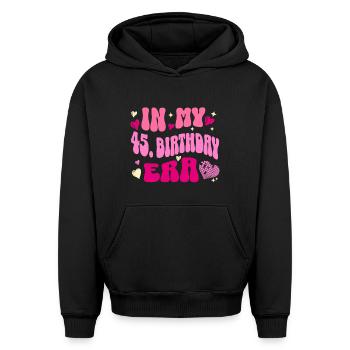 In my 45 birthday era - Oversized Heavyweight Unisex Hoodie - black - Front - AI Model Female 172 light (172cm) & AI Model Male 185 light (185cm)