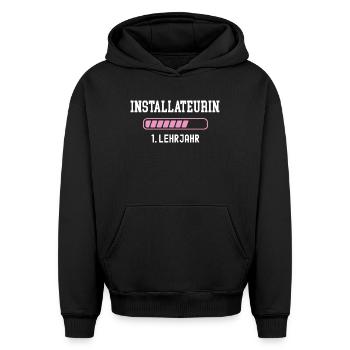 Plumber training 1 year of apprenticeship first year - Oversized Heavyweight Unisex Hoodie - black - Front - AI Model Female 172 light (172cm) & AI Model Male 185 light (185cm)