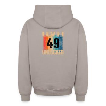Birthday Happy Birthday Level Unlocked 49 years - Oversized Heavyweight Unisex Zip Hoodie - taupe - Back - AI Model Male 178 light (178cm)