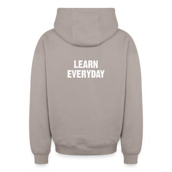 Learn Everyday Bold Typography - Oversized Heavyweight Unisex Zip Hoodie - taupe - Back - AI Model Male 178 light (178cm)
