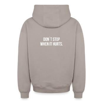 DON ́T STOP WHEN IT HURTS. | Greyline Official - Oversized Heavyweight Unisex Zip Hoodie - taupe - Back - AI Model Male 178 light (178cm)