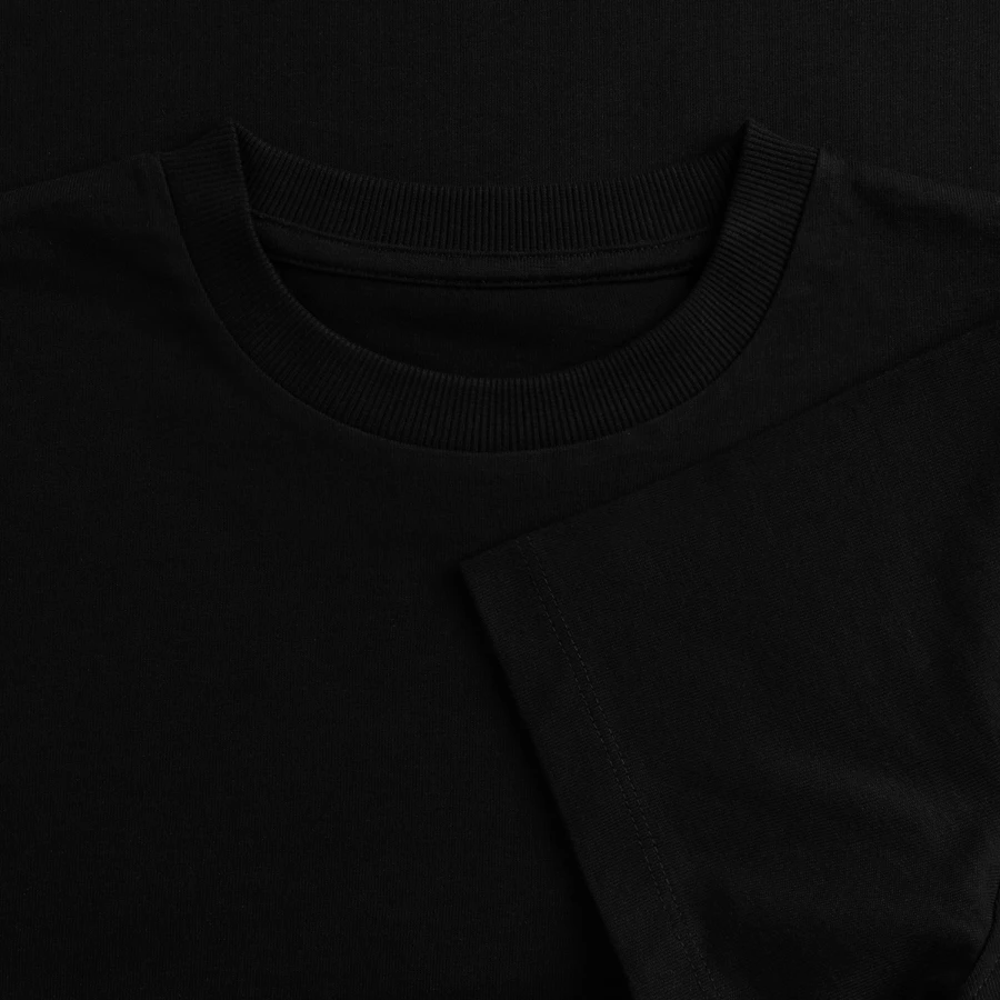 Montreux badge on a women’s premium oversized organic cropped t-shirt, black, neck label