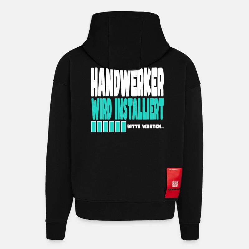 Handwerker wird installiert - Hoodie- made by SPREAD - SOLID BLACK