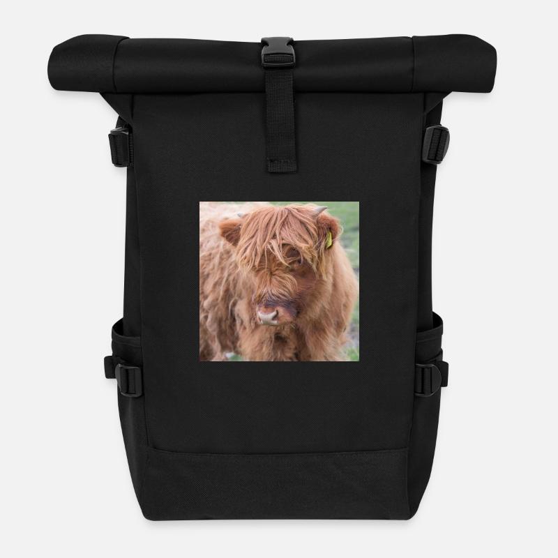 A Highland cattle in the Scottish Highlands - Roll Top Backpack - black