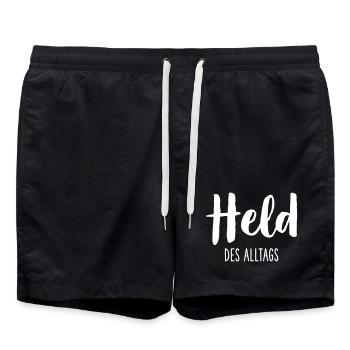 Held des Alltags – Starkes Statement Textdesign - Badeshorts - Schwarz - Vorne - AI Model Male 185 light (185cm)