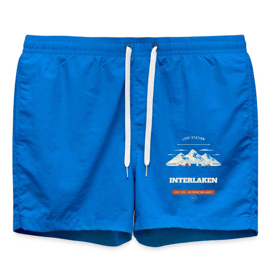Interlaken badge on a swim trunks, cobalt blue