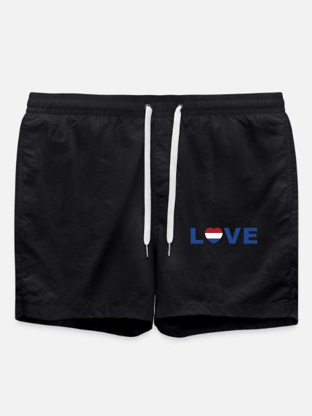 Vibrierendes Herz mit bunter Flagge - Badeshorts - Schwarz