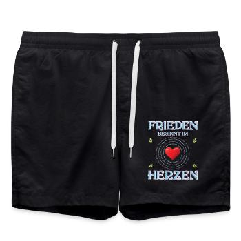 Frieden beginnt im Herzen (in 100 Sprachen) - Badeshorts - Schwarz - Vorne - AI Model Male 185 light (185cm)