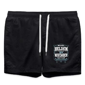 Wahre Helden werden im November geboren - Badeshorts - Schwarz - Vorne - AI Model Male 185 light (185cm)