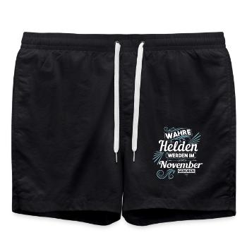 Wahre Helden wurden im November geboren - Badeshorts - Schwarz - Vorne - AI Model Male 185 light (185cm)
