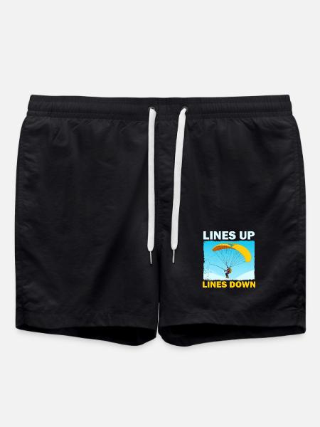 Crashing parachutist with banner - Swim Trunks - black